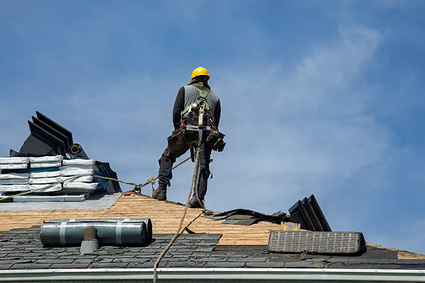 Professional Gutter Installation technician working in Elwood, KS